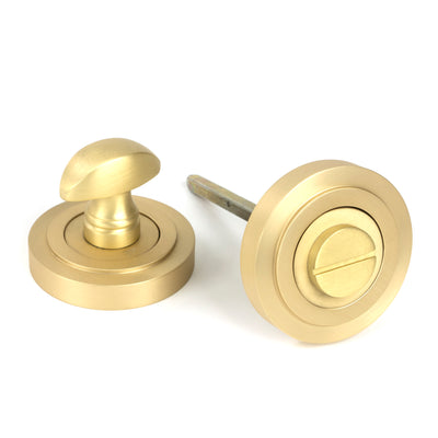 From The Anvil 50881 - Satin Brass Round Thumbturn Set (Art Deco)