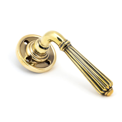 From The Anvil 45309 - Aged Brass Hinton Lever on Rose Set #finish_aged-brass