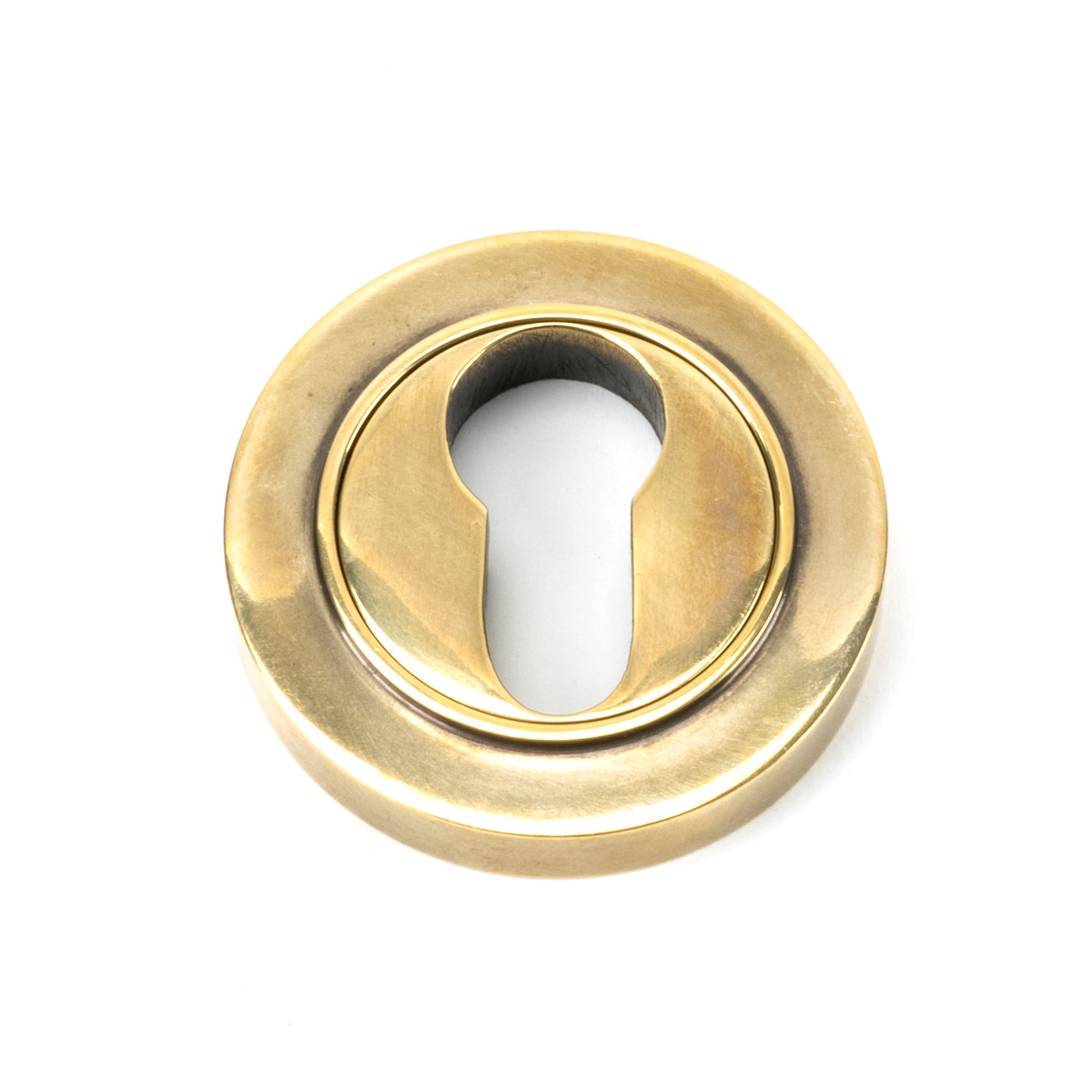 From The Anvil 49536 - Matt Black Round Escutcheon (Plain) #finish_aged-brass