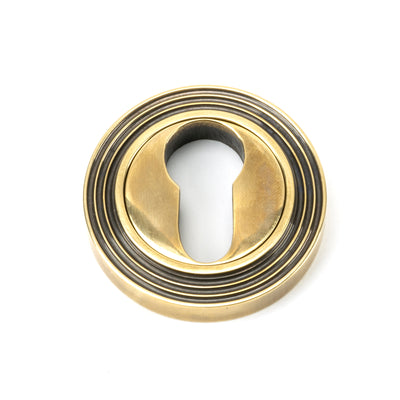 From The Anvil 45709 - Aged Brass Round Euro Escutcheon (Beehive) #finish_aged-brass