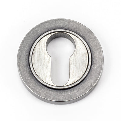 From The Anvil 46117 - Polished Bronze Round Escutcheon (Plain) #finish_pewter-patina