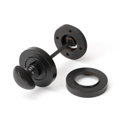 From The Anvil 46105 - Aged Bronze Round Thumbturn Set (Plain)