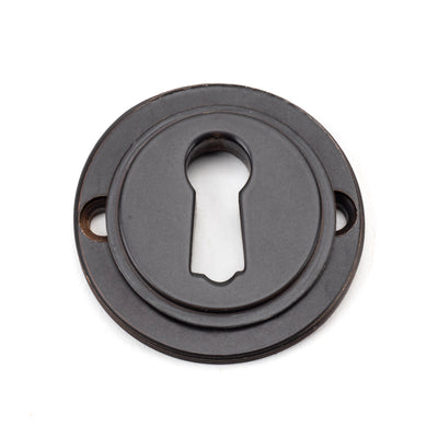 From The Anvil 46115 - Aged Bronze Round Escutcheon (Beehive)