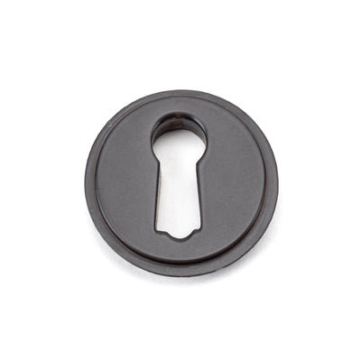 From The Anvil 46113 - Aged Bronze Round Escutcheon (Plain)