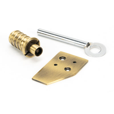 From The Anvil 49917 - Aged Brass Key-Flush Sash Stop #finish_aged-brass