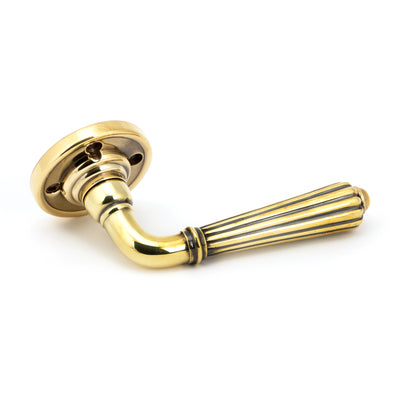 From The Anvil 50081 - Aged Brass Hinton Lever on Rose Set - Unsprung