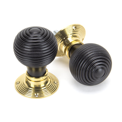 From The Anvil 91729 - Ebony & Polished Brass Beehive Mortice/Rim Knob Set  #finish_ebony-&-polished-brass