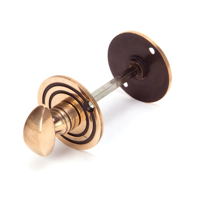 From The Anvil 91930 - Polished Bronze Round Bathroom Thumbturn  #finish_polished-bronze