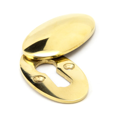 From The Anvil 91987 - Polished Brass Oval Escutcheon & Cover #finish_polished-brass